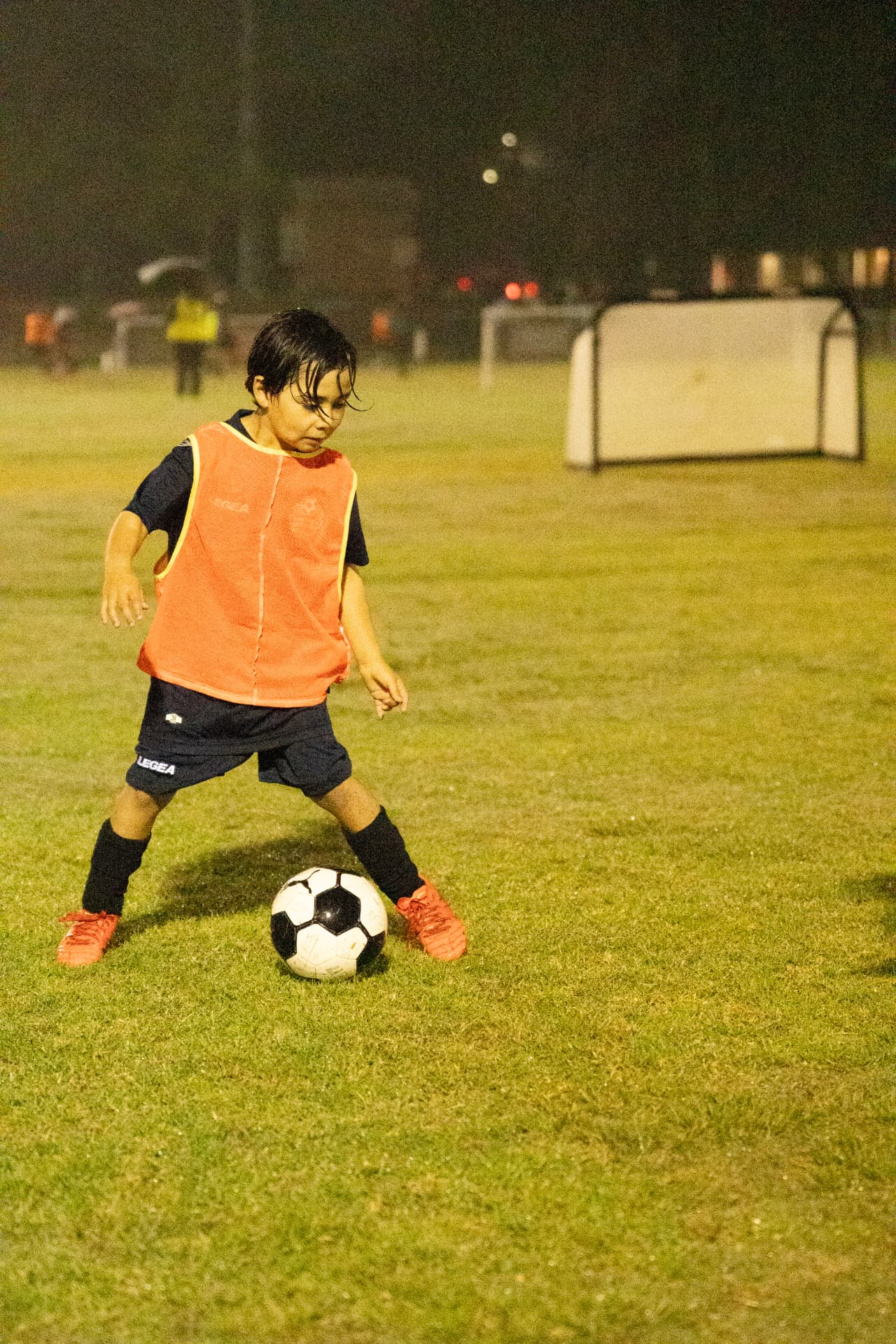 Young footballer practising ball control at a NextGen session